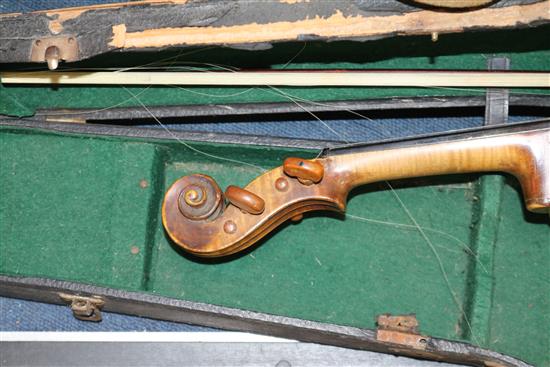 A full sized cased violin with bow